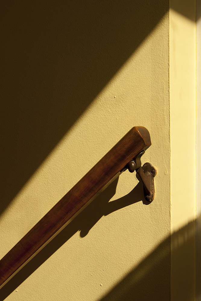 Early morning light hitting the banister