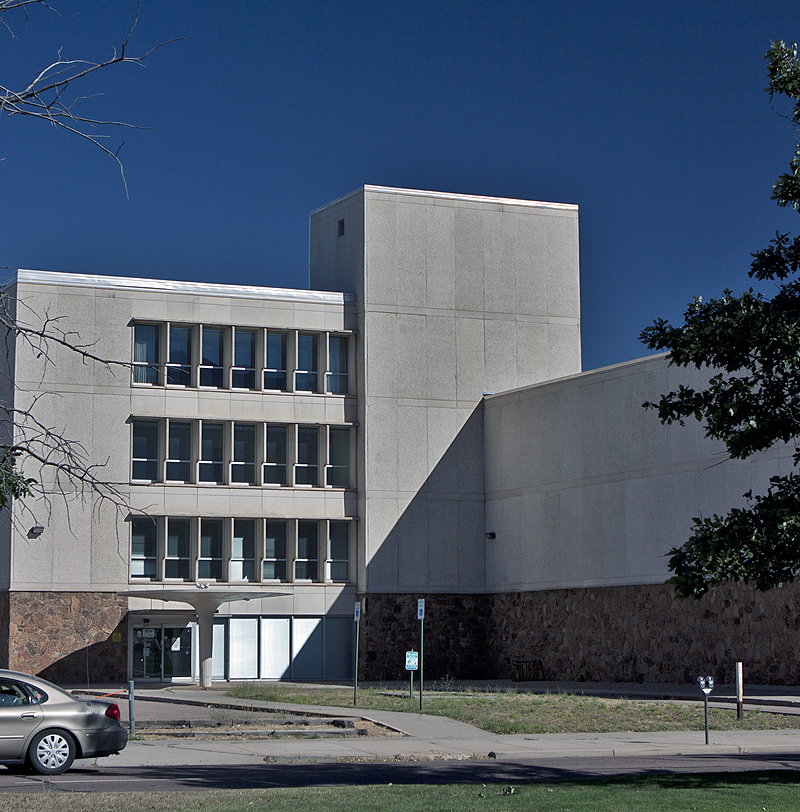 A vacant building on Nevada near Colorado. A nod to FL Wright, Le Corbusier. Ick.