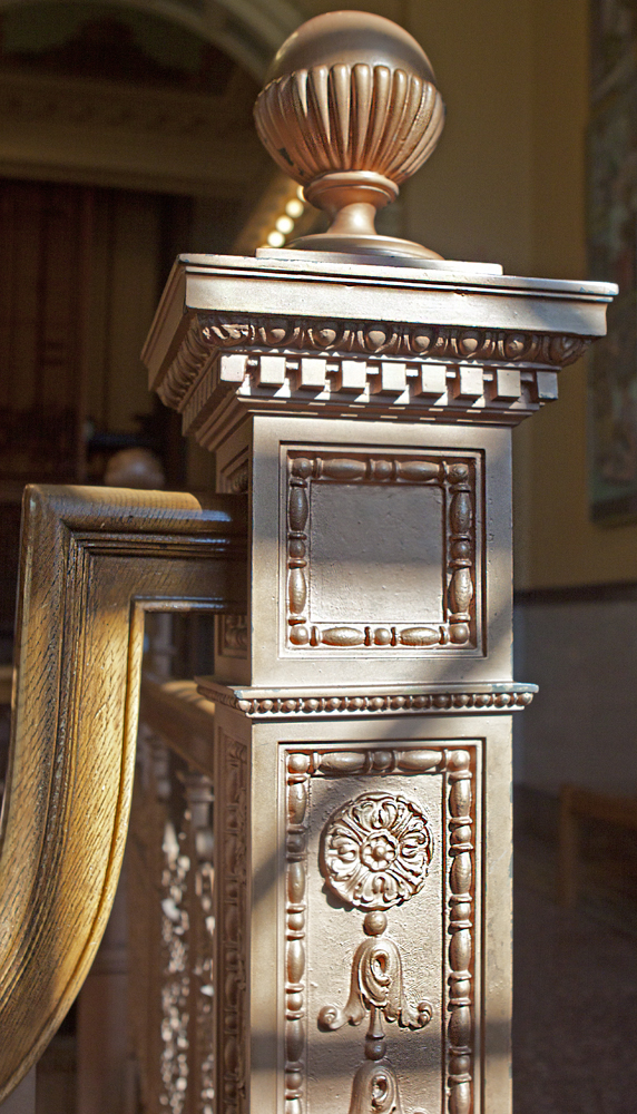 Stairwell detail; iron and wood