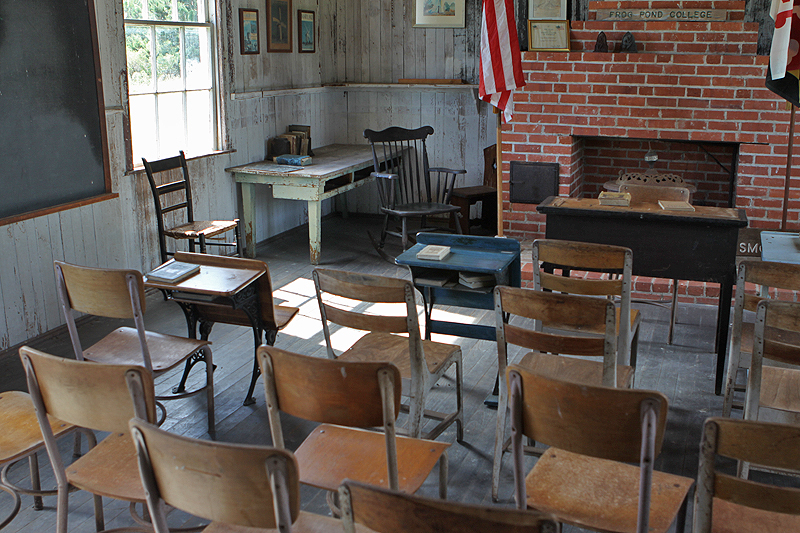 Schoolhouse; note inscription above hearth: 