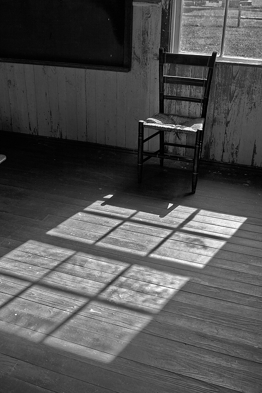 Schoolhouse; chair and floorboards