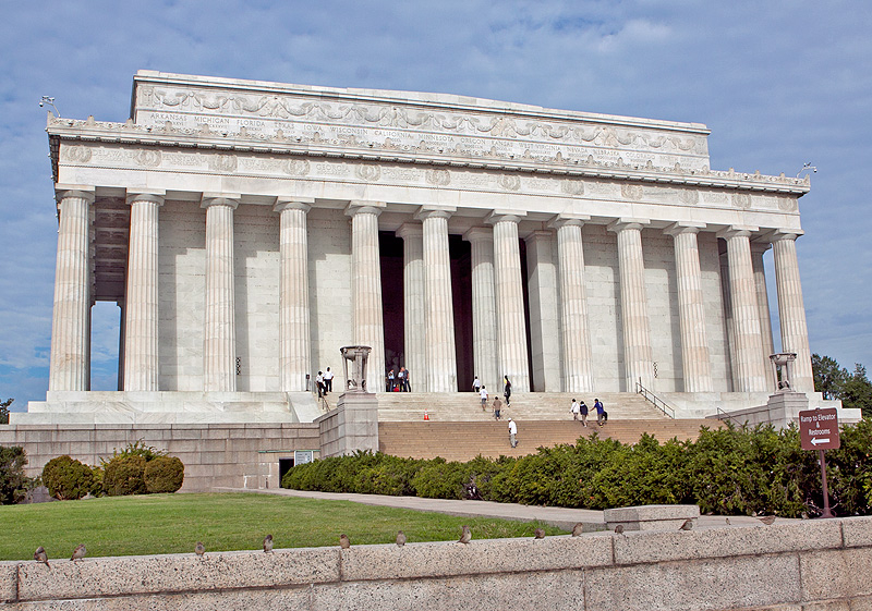 Note the Greek vase in the column on the left