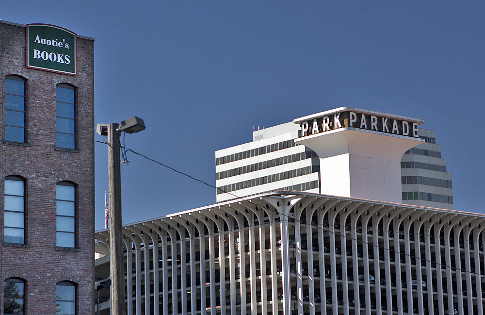 Not quite sure about this - parking lot, looking like ~1970 build..why the tower?