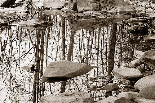 Rocks, reflections in stream